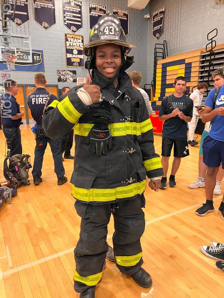 BHS student looking good in that gear!  Maybe that thumbs up means he'll think about joining :-)